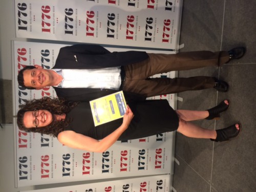 Doug Anderson with Dana holding her award on the stage