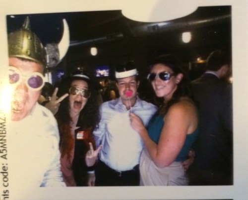 Dana with Meredith and other celebrants at a photo booth