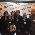 Dana with her family and the award