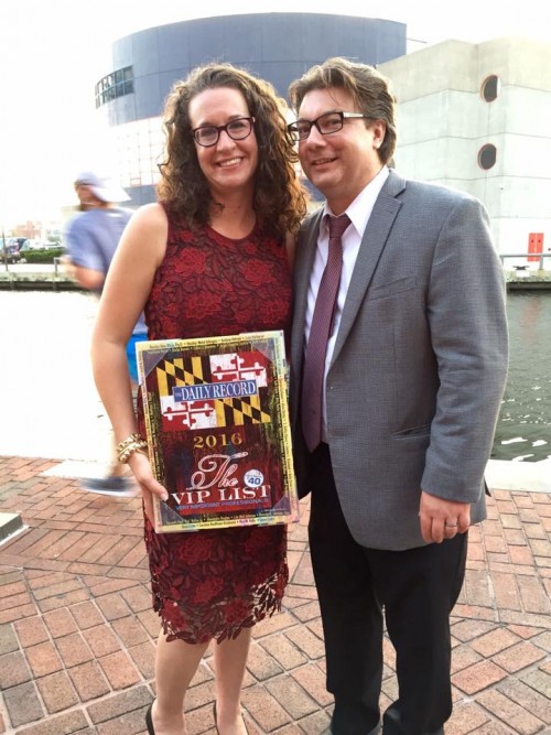 Dana and Preston Blay with Dana's award in the Inner Harbor of Baltimore